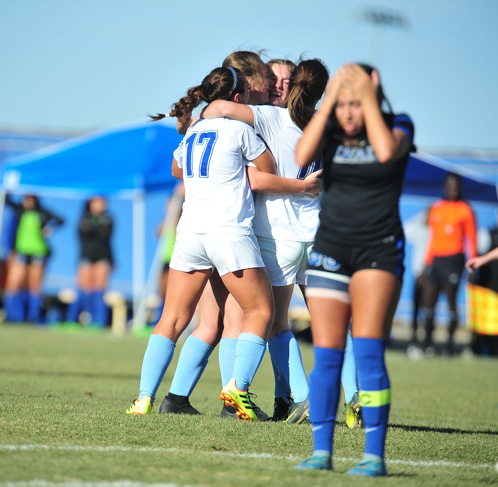Embry Riddle players celebrate the game tying goal by Ashley Askevold late in regulation as the Eagles take on Hope International in the first round of the NAIA National Championship Tournament in Prescott Saturday, November 17, 2018. (Les Stukenberg/Courier).