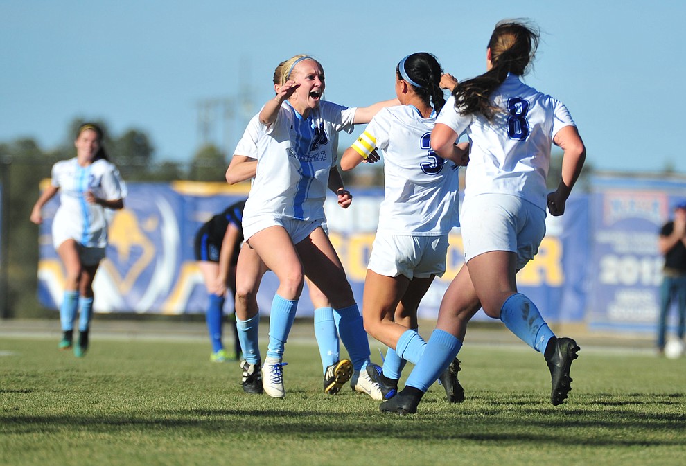 Embry Riddle players celebrate Krista Lee's overtime goal as the Eagles beat Hope International in the first round of the NAIA National Championship Tournament in Prescott Saturday, November 17, 2018. (Les Stukenberg/Courier).
