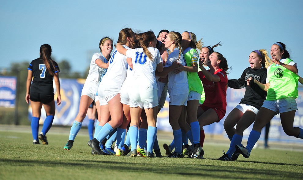 Embry Riddle players celebrate Krista Lee's overtime goal as the Eagles beat Hope International in the first round of the NAIA National Championship Tournament in Prescott Saturday, November 17, 2018. (Les Stukenberg/Courier).