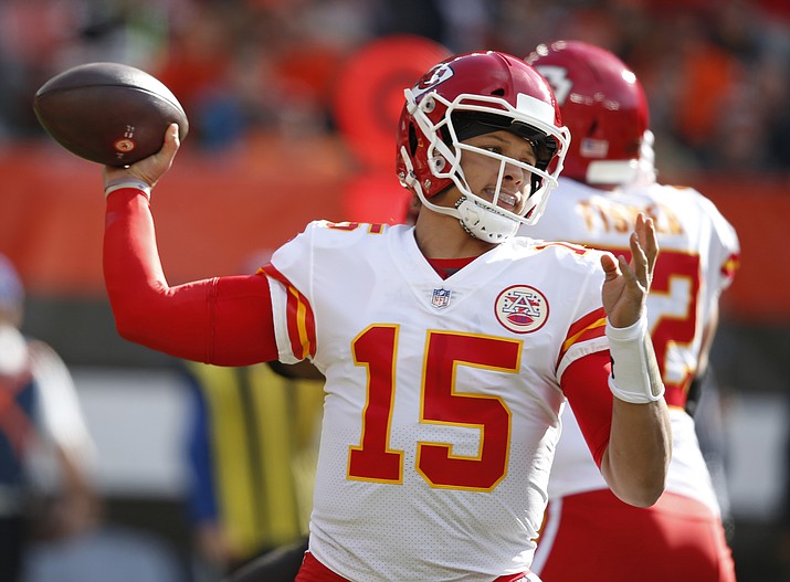In this Sunday, Nov. 4, 2018 file photo, Kansas City Chiefs quarterback Patrick Mahomes throws during the first half of an NFL football game against the Cleveland Browns in Cleveland. What some are calling the NFL’s Game of the Year already has made huge headlines by being moved out of Mexico City because of poor playing conditions. Chiefs-Rams is back in Los Angeles. (Ron Schwane/AP, file)