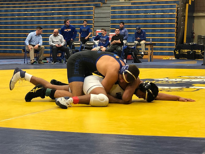 Embry-Riddle sophomore James Williams holds top position against Life Pacific wrestler Kevin Pastor in their match on Friday, Nov. 16, 2018, in Prescott. (Chris Whitcomb/Courier)