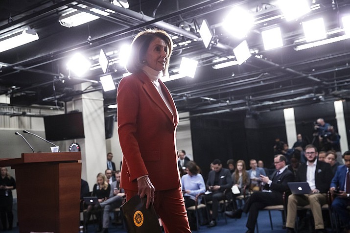 In this Nov. 15, 2018, photo, House Minority Leader Nancy Pelosi, D-Calif., leaves a news conference at the Capitol in Washington. Pelosi’s bid to return as House speaker is putting newly elected Democrats in a spot. The speaker’s vote will among the first votes cast in the new Congress, with all eyes will be watching -- and cameras rolling for TV ads -- to see if the incoming freshmen who promised to oppose Pelosi on the campaign trail will actually do so in the House chamber. (AP Photo/J. Scott Applewhite)