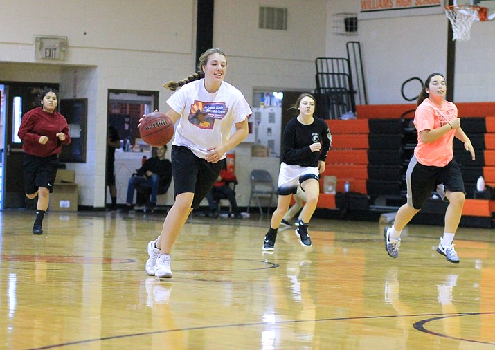 Amaryssa Orozco brings the ball down court during a preseason drill for the Lady Vikes basketball team.  (Wendy Howell/WGCN)