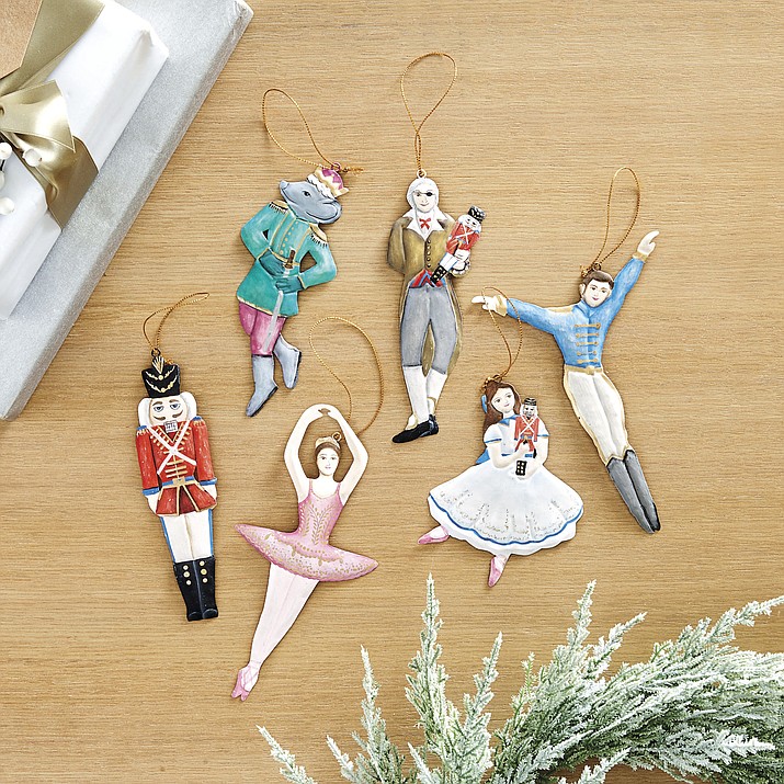 Ballard Designs’ Nutcracker collection of ornaments. Each handmade, handpainted 3D ornament features a character from the iconic holiday play. (Ballard Designs via AP)