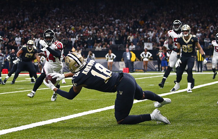 New Orleans Saints wide receiver Keith Kirkwood (18) pulls in a touchdown reception in the second half of an NFL football game against the Atlanta Falcons in New Orleans, Thursday, Nov. 22, 2018. (AP Photo/Butch Dill)