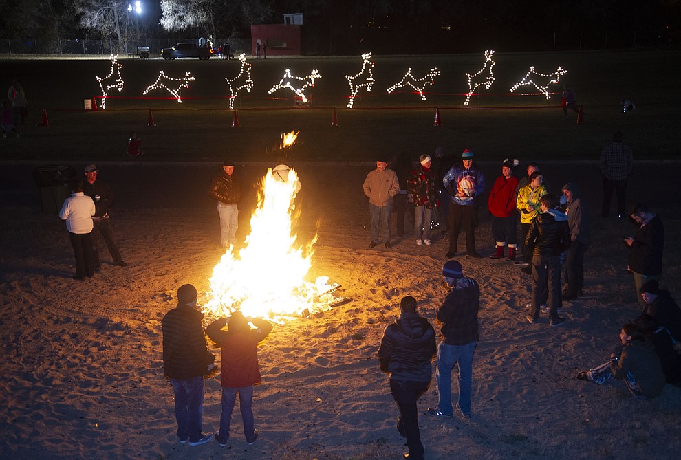 A bonfire was held at Prescott Mile High Middle School following the 23rd annual Holiday Light Parade held throughout the downtown Prescott streets Saturday, Nov. 24, 2018. (Les Stukenberg/Courier).