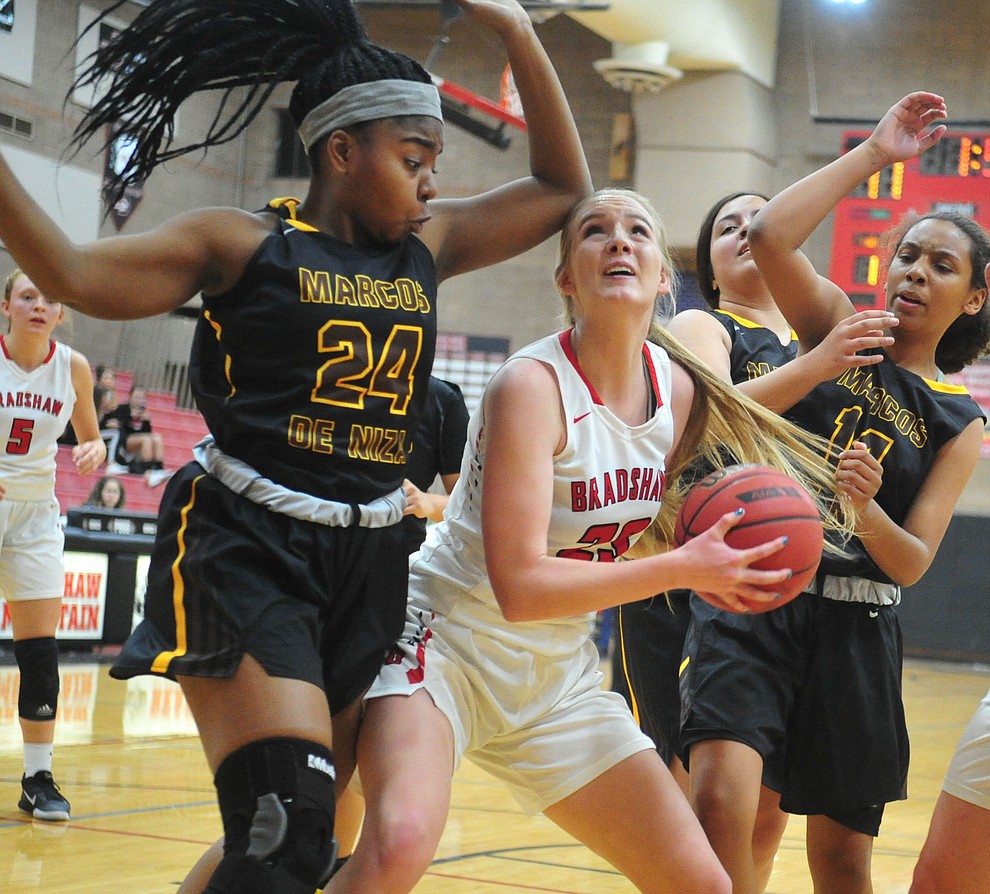 Bradshaw Mountain's Rylee Bundrick battles in the lane as the Bears take on Marcos de Niza Tuesday, Nov. 27, 2018 in Prescott Valley. (Les Stukenberg/Courier).