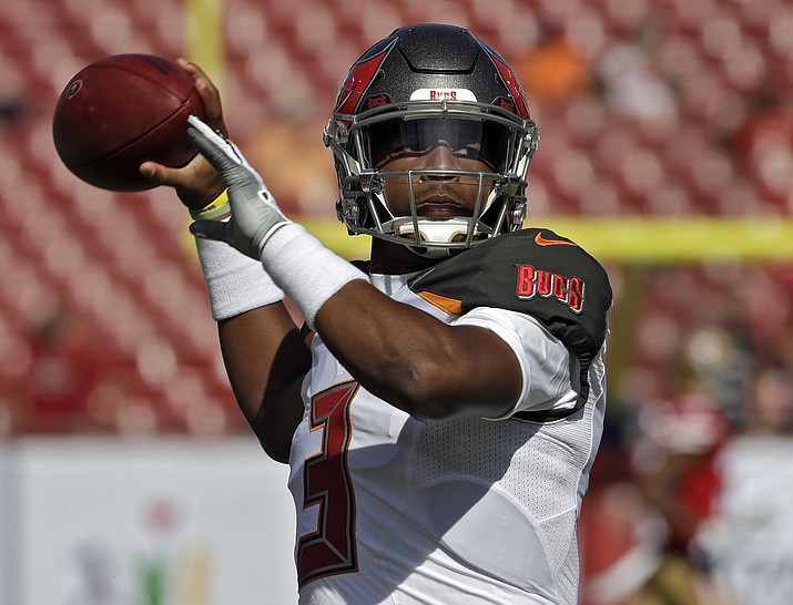 Tampa Bay Buccaneers quarterback Jameis Winston warms up before a football game against San Francisco Sunday, Nov. 25, 2018. (Chris O'Meara/AP)