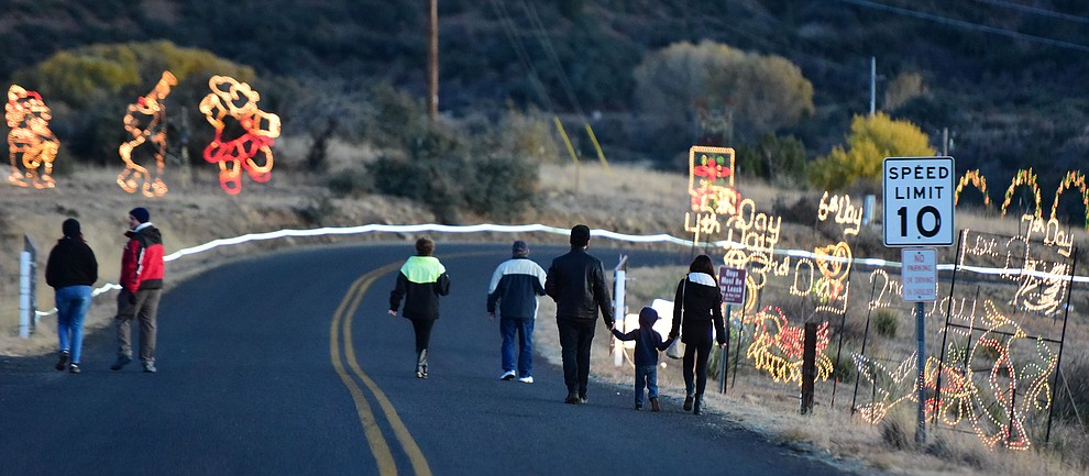 The Valley of Lights held their now annual stroll through Tuesday, Nov. 27, 2018 in Prescott Valley. The event allows people to walk through the display and for people to take their time seeing all the dsiplays while enjoying carolers and hot chocolate at various stops along the way. (Les Stukenberg/Courier).