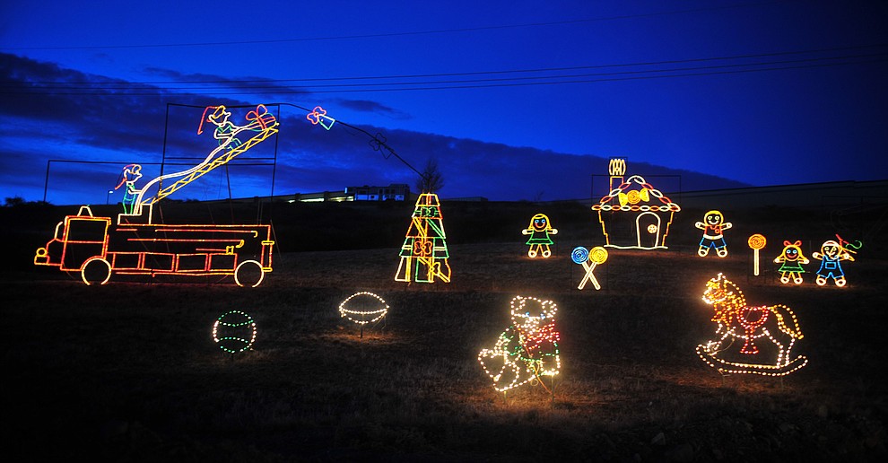 The Valley of Lights held their now annual stroll through Tuesday, Nov. 27, 2018 in Prescott Valley. The event allows people to walk through the display and for people to take their time seeing all the dsiplays while enjoying carolers and hot chocolate at various stops along the way. (Les Stukenberg/Courier).