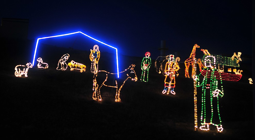 The Valley of Lights held their now annual stroll through Tuesday, Nov. 27, 2018 in Prescott Valley. The event allows people to walk through the display and for people to take their time seeing all the dsiplays while enjoying carolers and hot chocolate at various stops along the way. (Les Stukenberg/Courier).