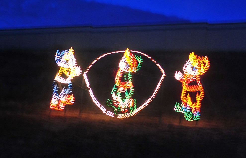 The Valley of Lights held their now annual stroll through Tuesday, Nov. 27, 2018 in Prescott Valley. The event allows people to walk through the display and for people to take their time seeing all the dsiplays while enjoying carolers and hot chocolate at various stops along the way. (Les Stukenberg/Courier).
