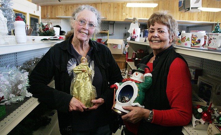 Rosemarie Coker and Carol Keeton of the Beaver Creek Kiwanis, from left. From 10 a.m. until 5 p.m. Thursdays, Fridays and Saturdays through Dec. 15, the Kiwanis chapter will open the community’s old Barefoot Country Market as its Adopt-a-Family Christmas House to raise money to feed and provide Christmas presents for Beaver Creek families. VVN/Bill