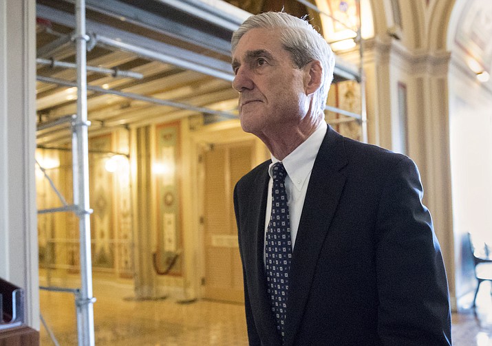 In this June 21, 2017, file photo, special counsel Robert Mueller departs after a meeting on Capitol Hill in Washington. Mueller is back. After a quiet few months in the run-up to the midterm elections, the special counsel’s Russia investigation is heating up again with a string of tantalizing new details emerging this week.(AP Photo/J. Scott Applewhite, File)