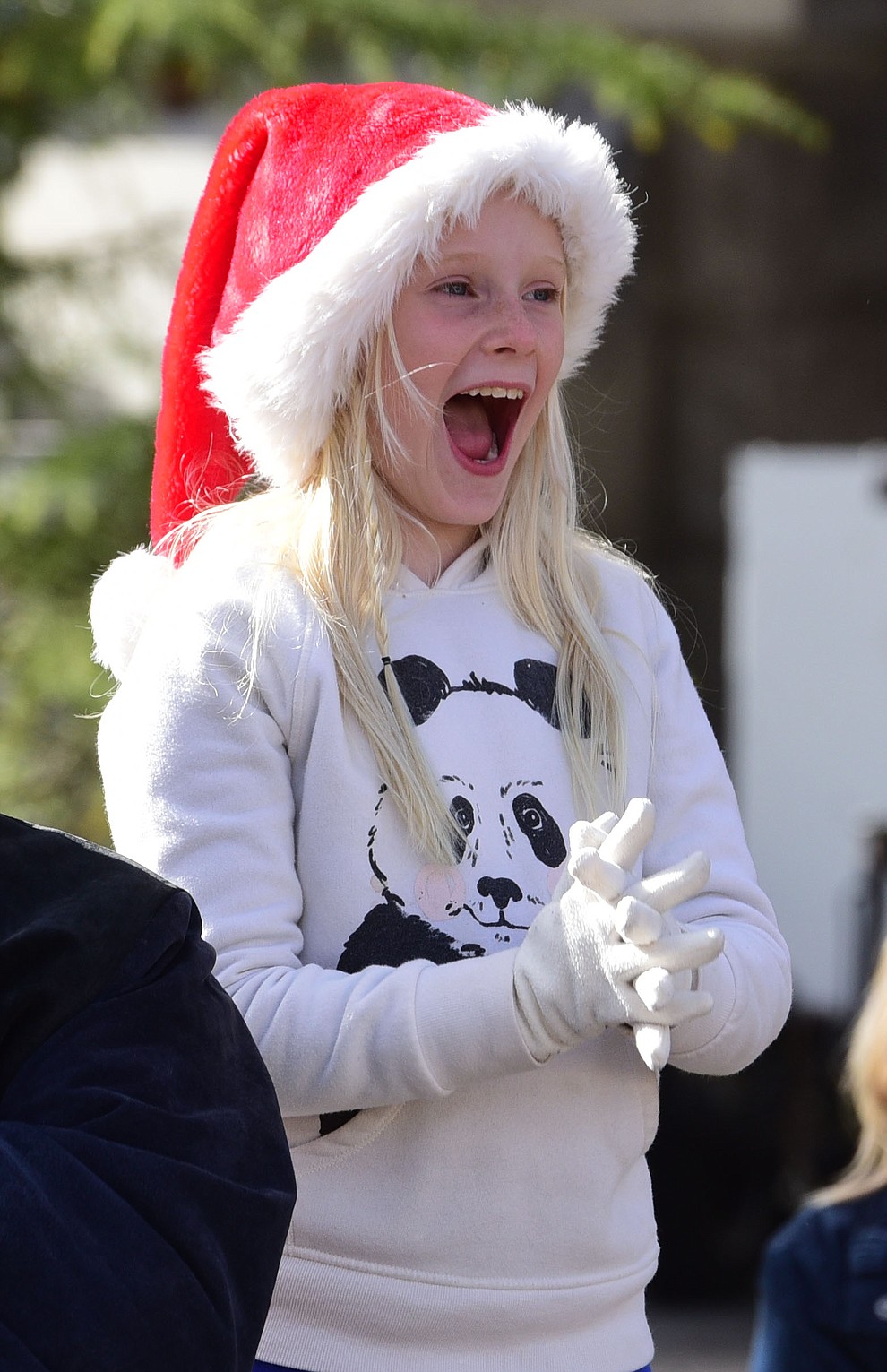 Kinsley Alexander was excited as ninety floats, marching bands and special groups participate in the 38th annual Prescott Chamber Christmas Parade in downtown Prescott Satuday, Dec. 1, 2018. (Les Stukenberg/Courier).