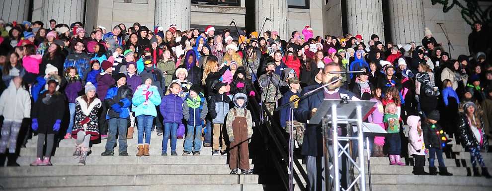 Children gather on the courthouse steps as part of the 64th Annual Christmas Yavapai County Courthouse Lighting in downtown Prescott Satuday, Dec. 1, 2018. (Les Stukenberg/Courier).