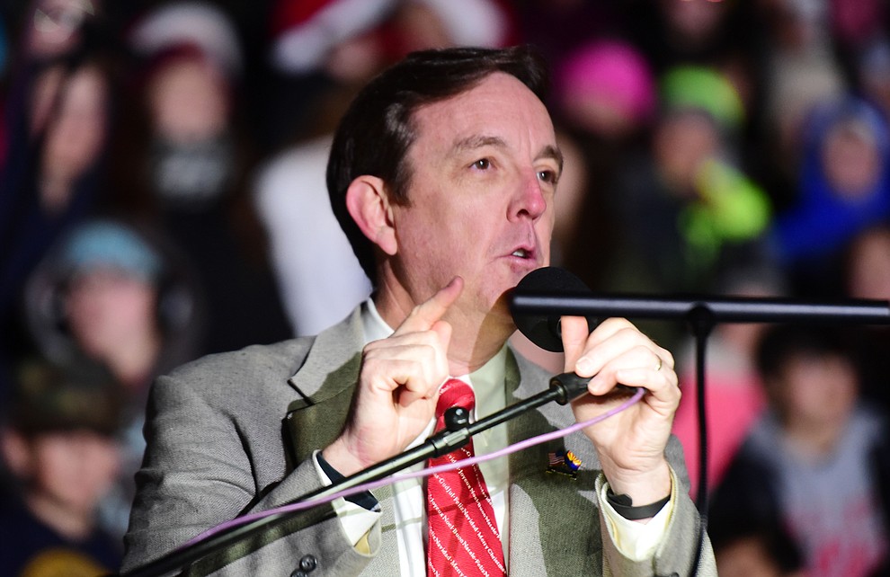 Ken Bennett recites the Christmas Story as part of the 64th Annual Christmas Yavapai County Courthouse Lighting in downtown Prescott Satuday, Dec. 1, 2018. (Les Stukenberg/Courier).