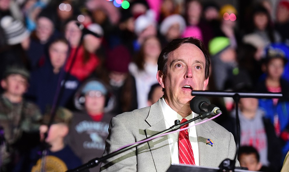 Ken Bennett recites the Christmas Story as part of the 64th Annual Christmas Yavapai County Courthouse Lighting in downtown Prescott Satuday, Dec. 1, 2018. (Les Stukenberg/Courier).