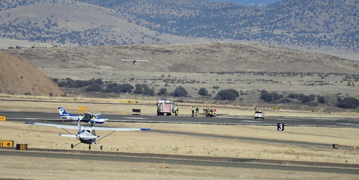 A plane landed safely, without landing gear, at the Prescott airport Tuesday, Dec. 4, 2018. (Les Stukenberg/Courier)