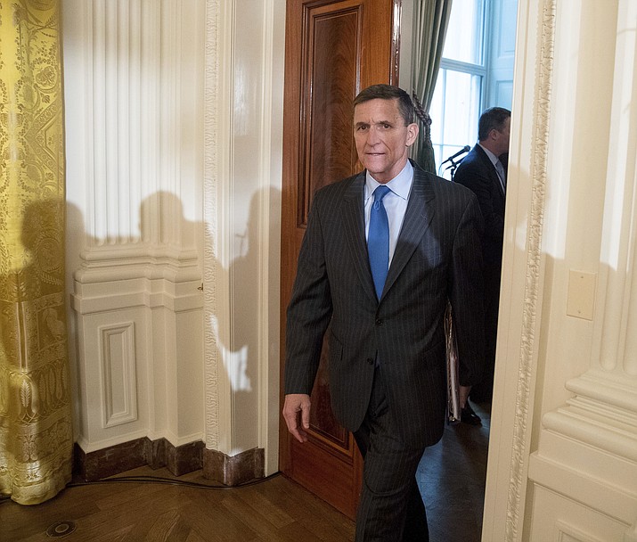 In this Jan. 22, 2017 file photo, National Security Adviser Michael Flynn arrives for a White House senior staff swearing in ceremony in the East Room of the White House, in Washington. (AP Photo/Andrew Harnik, File)