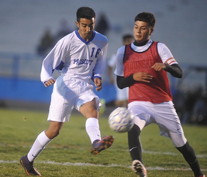 Prescott’s Claudio Orozco (16) takes a shot on goal Nov. 28, 2017, in Prescott. Orozco scored a goal in the 49th minute to help the Badgers beat Poston Butte 7-2 on Thursday, Dec. 6, 2018. (Les Stukenberg/Courier, file)