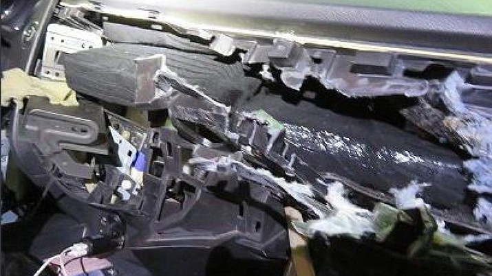 A dog trained to detect narcotics found nearly 23 pounds of cocaine hidden inside the dashboard of a woman's SUV as she attempted to enter the United States at Arizona's Port of Nogales. (U.S. Customs and Border Protection)