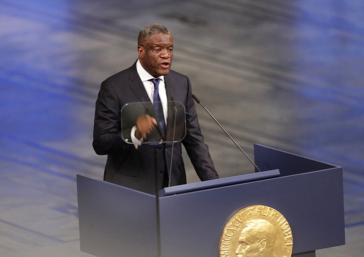 Nobel Peace Prize laureate Denis Mukwege delivers his speech, during the Nobel Peace Prize Ceremony in Oslo Town Hall, in Norway, Monday, Dec. 10, 2018, Dr. Denis Mukwege and Nadia Murad of Iraq, shared the 9-million Swedish kronor ($1 million) Nobel Peace Prize. Mukwege was honored for his work helping sexually abused women at the hospital he founded in the Democratic Republic of Congo. Murad, a Yazidi, won for her advocacy for sex abuse victims after being kidnapped by Islamic State militants. (Berit Roald/NTB scanpix via AP)
