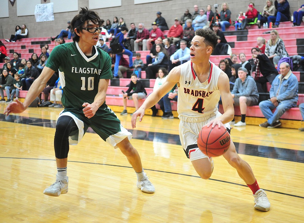 Bradshaw Mountain's Carter John drives to the baseline as the Bears take on the Flagstaff Eagles Tuesday, Dec. 11, 2018 in Prescott Valley. (Les Stukenberg/Courier).