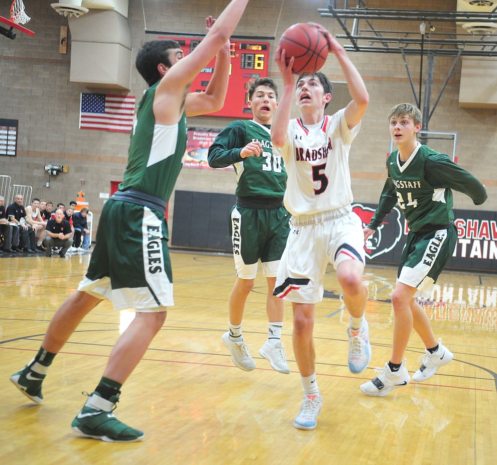 Bradshaw Mountain's Tripp Nestor drives through the lane as the Bears take on the Flagstaff Eagles Tuesday, Dec. 11, 2018 in Prescott Valley. (Les Stukenberg/Courier).