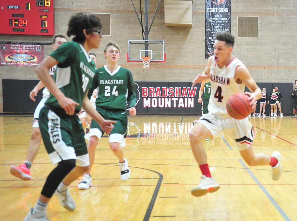 Bradshaw Mountain's Carter John goes airborne as the Bears take on the Flagstaff Eagles Tuesday, Dec. 11, 2018 in Prescott Valley. (Les Stukenberg/Courier).