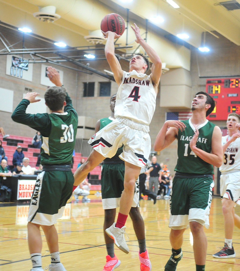 Bradshaw Mountain's Carter John goes airborne as the Bears take on the Flagstaff Eagles Tuesday, Dec. 11, 2018 in Prescott Valley. (Les Stukenberg/Courier).