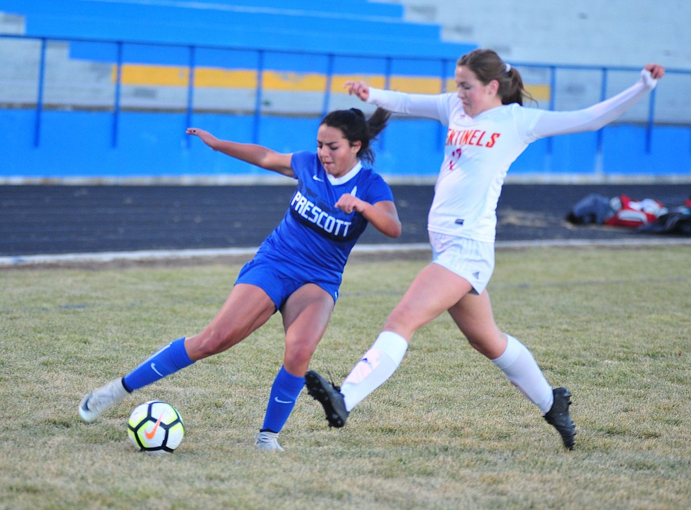 Prescott's Emma Alvarez moves the ball from the corner as the Badgers take on Seton Catholic Sentinels Tuesday, Dec. 11, 2018 in Prescott. (Les Stukenberg/Courier).