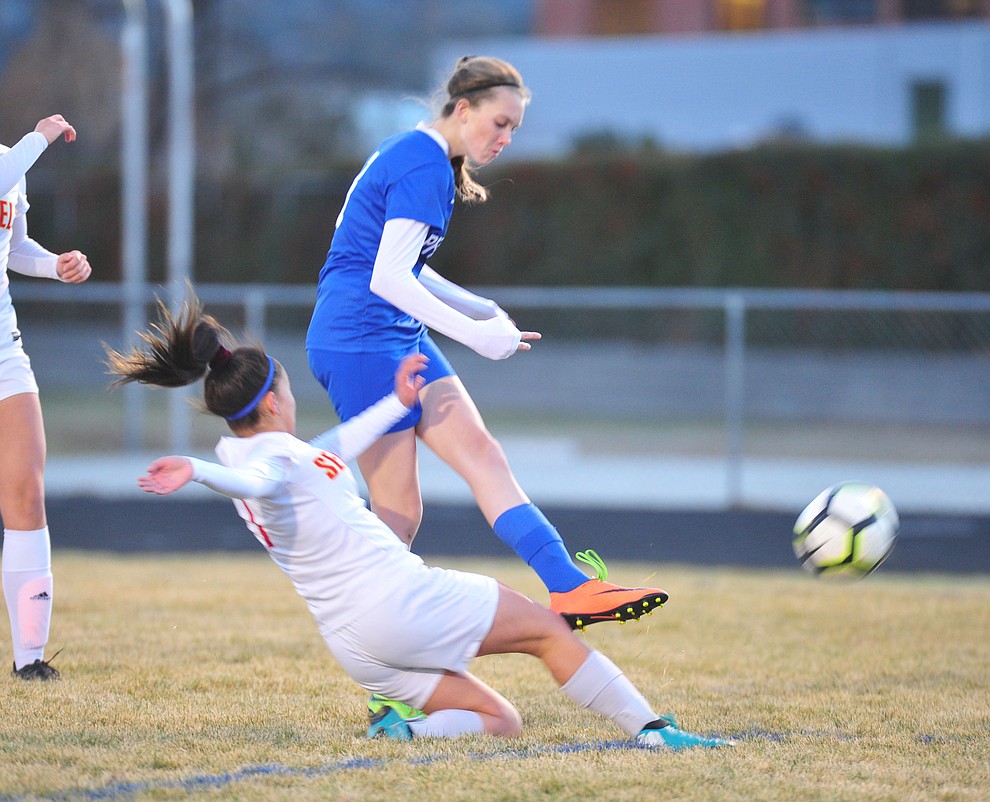 Prescott's Nicole Raiss takes a shot on goal as the Badgers take on Seton Catholic Sentinels Tuesday, Dec. 11, 2018 in Prescott. (Les Stukenberg/Courier).