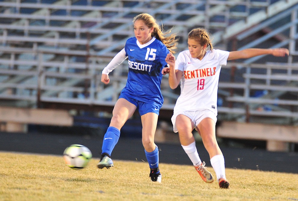 Prescott's Kari Kasun passes the ball to the middle as the Badgers take on Seton Catholic Sentinels Tuesday, Dec. 11, 2018 in Prescott. (Les Stukenberg/Courier).