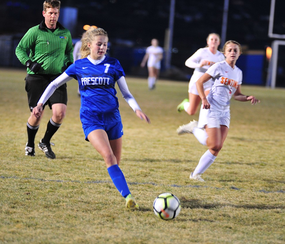Prescott's Lily Jensen drives the ball upfield as the Badgers take on Seton Catholic Sentinels Tuesday, Dec. 11, 2018 in Prescott. (Les Stukenberg/Courier).