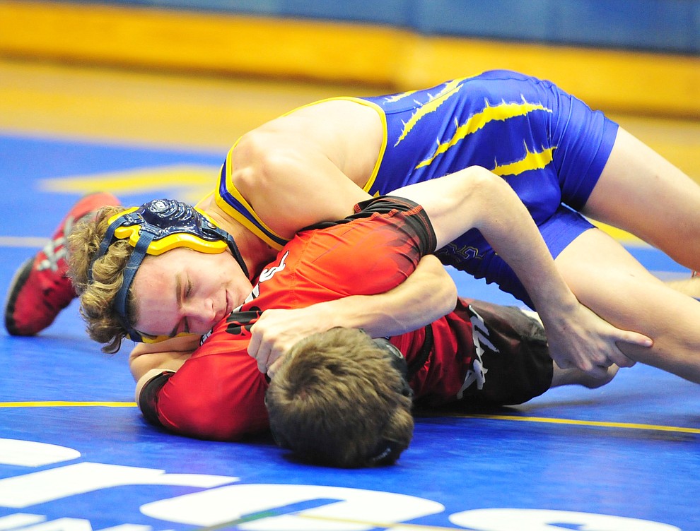 Prescott's Colton Tomitz works on Coconino's Payton Polder Wednesday, Dec. 12, 2018 in Prescott. (Les Stukenberg/Courier).