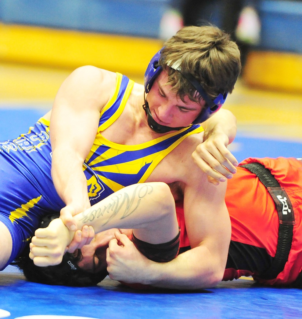 Prescott's Andrew Salberg works on Coconino's Kyle Munoz Wednesday, Dec. 12, 2018 in Prescott. (Les Stukenberg/Courier).