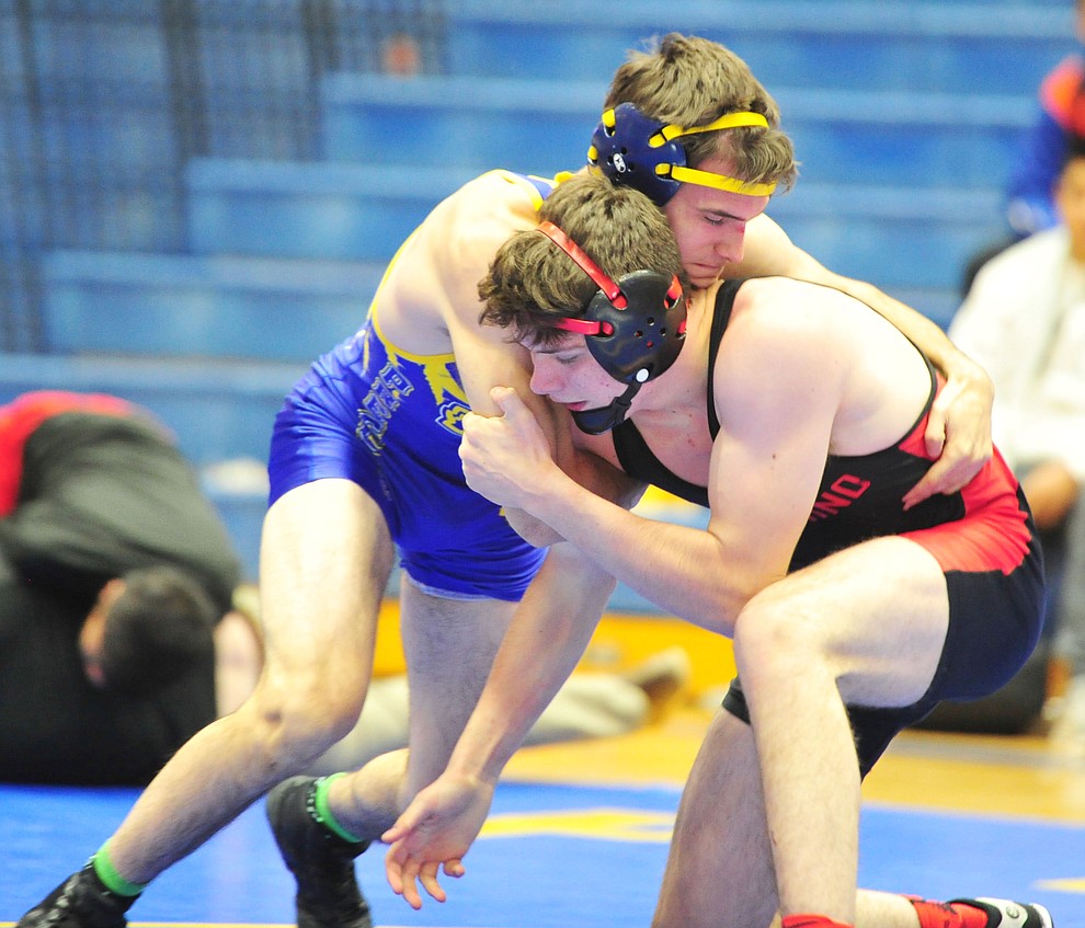 Prescott's Jack Northrup wrestles against Coconino's Talyn Godwin Wednesday, Dec. 12, 2018 in Prescott. (Les Stukenberg/Courier).