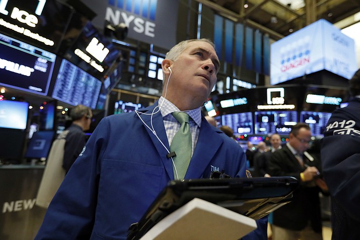 In this Nov. 29, 2018, file photo trader Timothy Nick works on the floor of the New York Stock Exchange. (Richard Drew/AP, File)