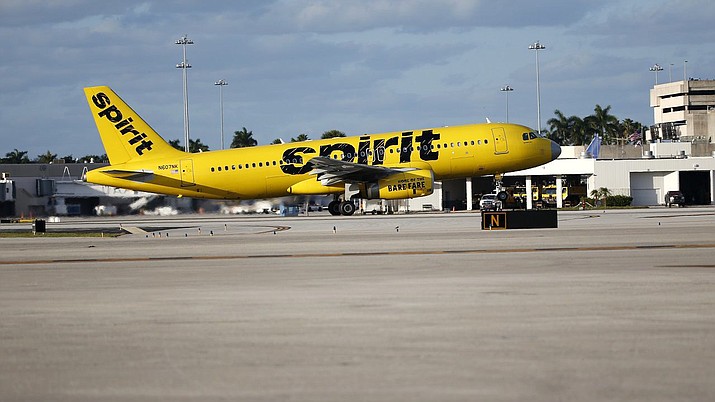 A Spirit Airlines Airbus Industrie A320 takes off from Palm Beach International Airport in West Palm Beach, Fla., Friday, Feb. 10, 2017. (AP Photo/Wilfredo Lee)