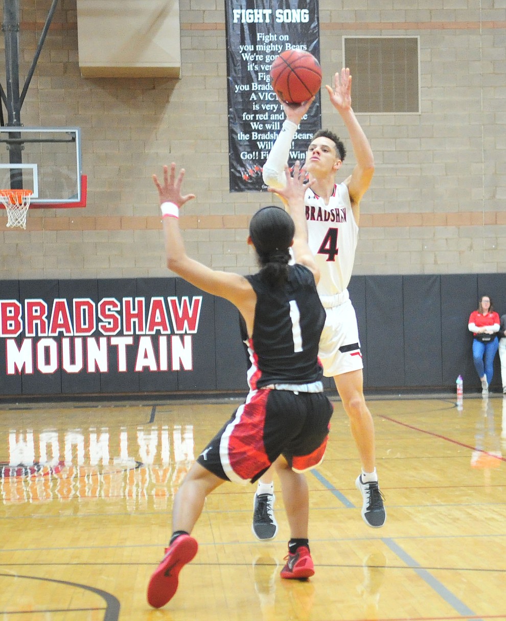 Bradshaw Mountain's Carter John takes a long range shot as the Bears hosted Coconino in a doubleheader hoops matchup Saturday, Dec. 15, 2018 in Prescott Valley. (Les Stukenberg/Courier).