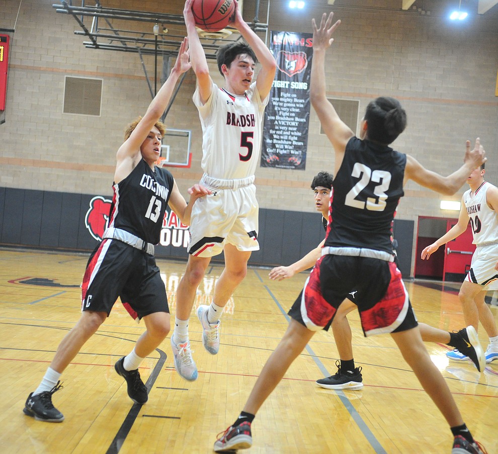 Bradshaw Mountain's Tripp Nestor passes the ball out as the Bears hosted Coconino in a doubleheader hoops matchup Saturday, Dec. 15, 2018 in Prescott Valley. (Les Stukenberg/Courier).