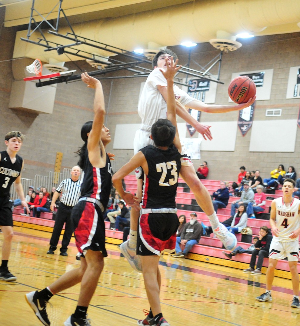 Bradshaw Mountain's Tripp Nestor goes airborne as the Bears hosted Coconino in a doubleheader hoops matchup Saturday, Dec. 15, 2018 in Prescott Valley. (Les Stukenberg/Courier).
