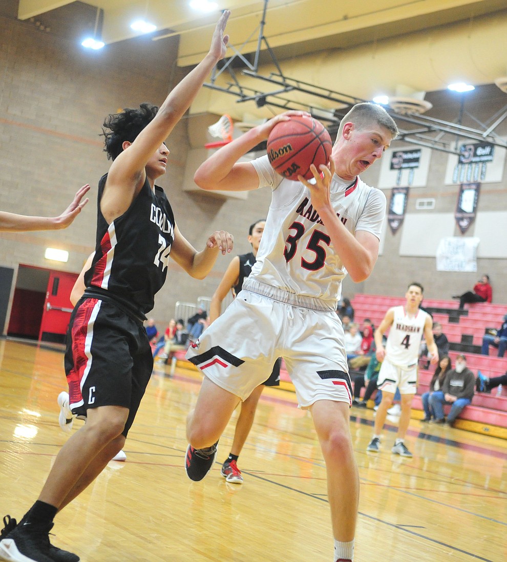 Bradshaw Mountain's Nate Summit grabs an offensive rebound as the Bears hosted Coconino in a doubleheader hoops matchup Saturday, Dec. 15, 2018 in Prescott Valley. (Les Stukenberg/Courier).
