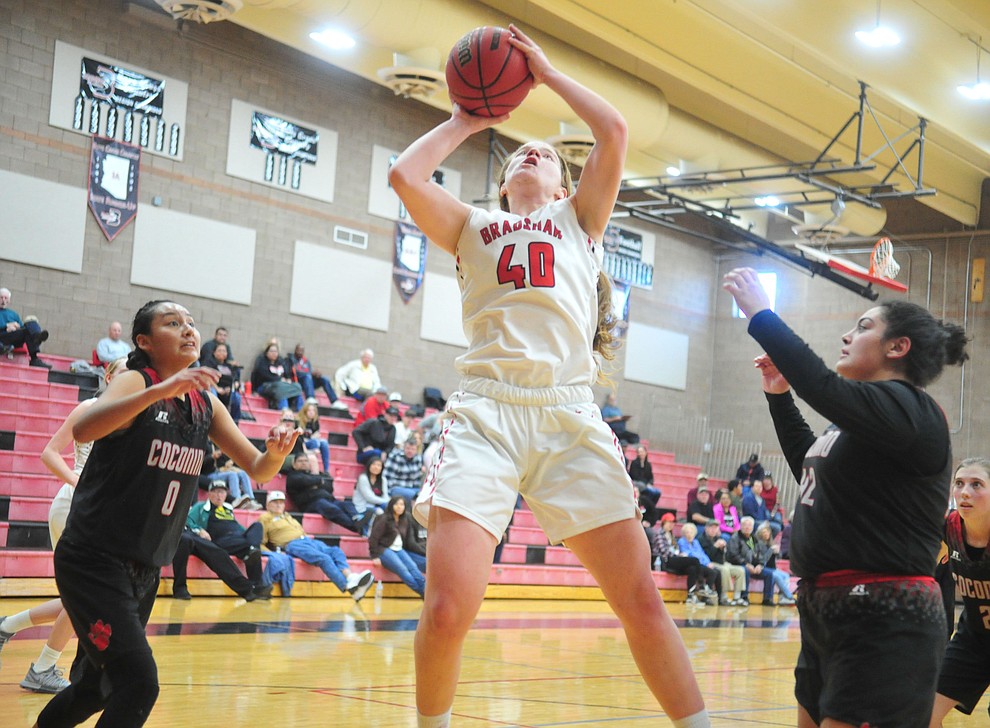 Bradshaw Mountain's Delanie Clark goes up between defenders as the Bears hosted Coconino in a doubleheader hoops matchup Saturday, Dec. 15, 2018 in Prescott Valley. (Les Stukenberg/Courier).
