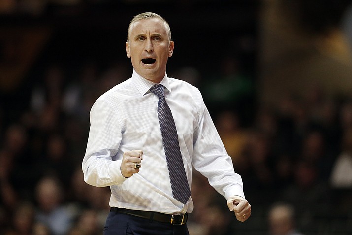 Arizona State head coach Bobby Hurley cheers on his players in the first half of an NCAA college basketball game against Vanderbilt, Monday, Dec. 17, 2018, in Nashville, Tenn. (Mark Humphrey/AP)