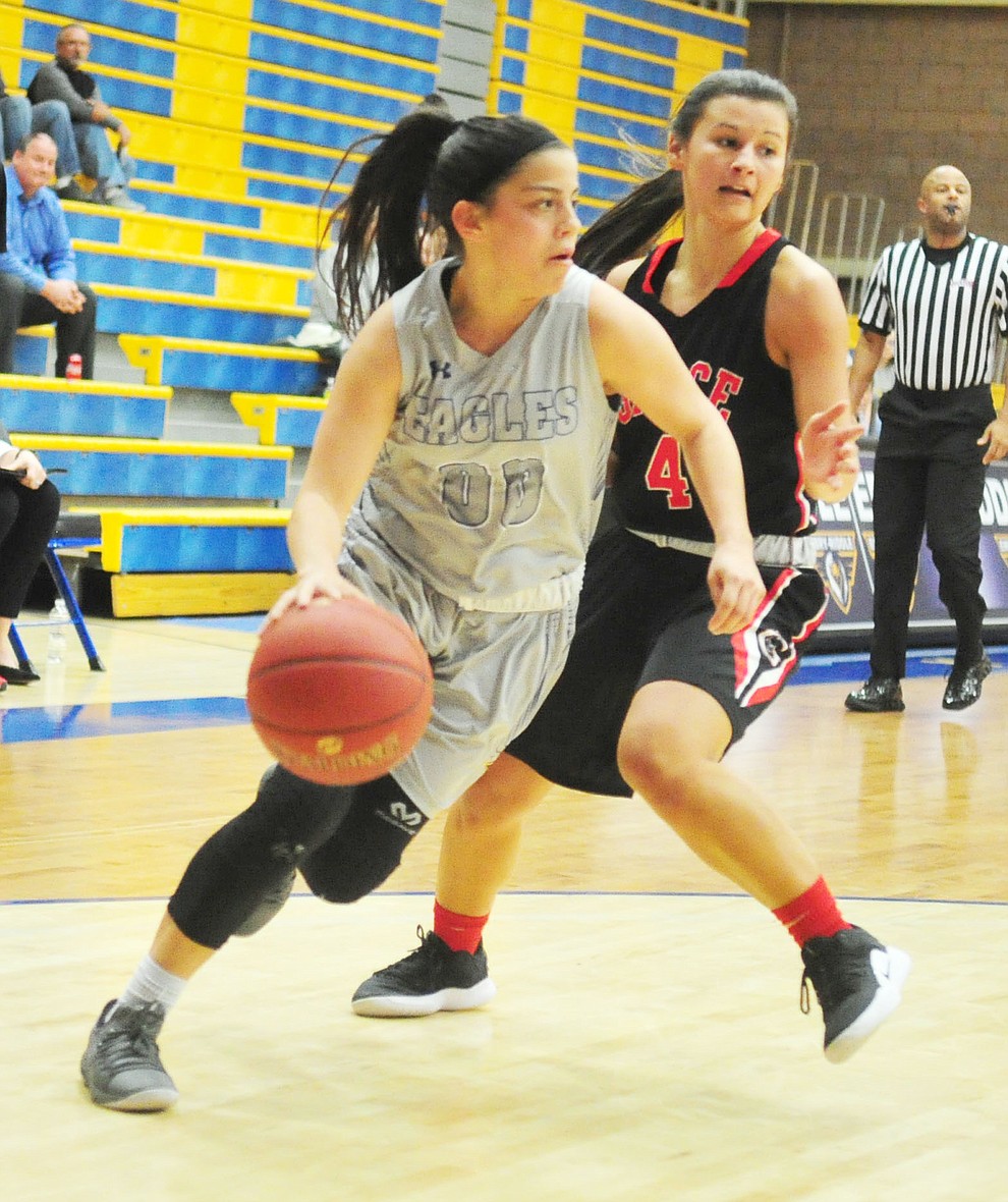 Embry Riddle's Haley Villegas drives past a defender as the Eagles hosted the Grace Lancers Tuesday, Dec. 18, 2018 in Prescott. (Les Stukenberg/Courier).