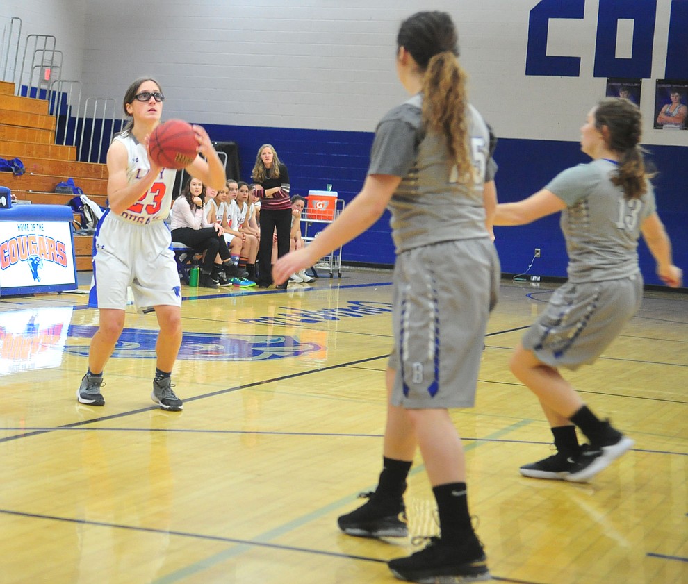 Chino Valley's Abbie Golden takes a three-point shot as the Cougars face the Bagdad Sultans Wednesday, Dec. 19, 2018 in Chino Valley. (Les Stukenberg/Courier).