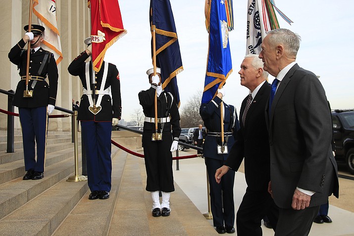 Defense Secretary Jim Mattis welcomes Vice President Mike Pence to the Pentagon, Wednesday, Dec. 19, 2018. (Manuel Balce Ceneta/AP)