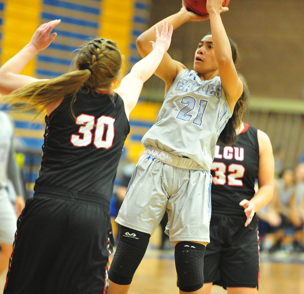 Embry Riddle's Jazlyn Maletino takes a shot under pressure as the Eagles face the Lincoln Christian Red Lions Thursday, Dec. 20, 2018 in Prescott. (Les Stukenberg/Courier).